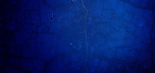 Scary dark blue grunge texture for background dark blue wall horror concept