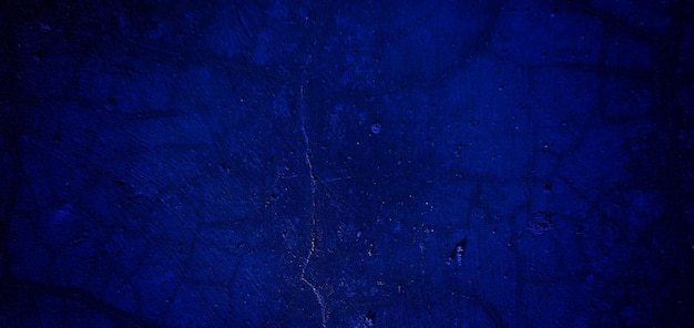 Scary dark blue grunge texture for background dark blue wall horror concept