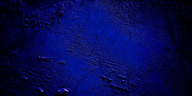 背景の濃紺の壁のホラーコンセプトの怖い濃紺グランジテクスチャ