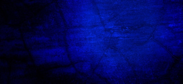 Scary dark blue grunge texture for background dark blue wall horror concept