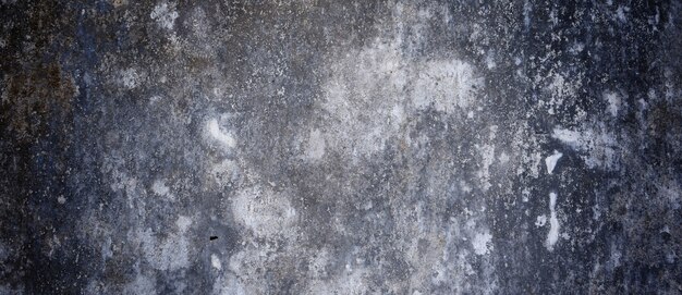 배경에 대한 무서운 어두운 시멘트. 얼룩과 흠집으로 가득한 오래된 벽