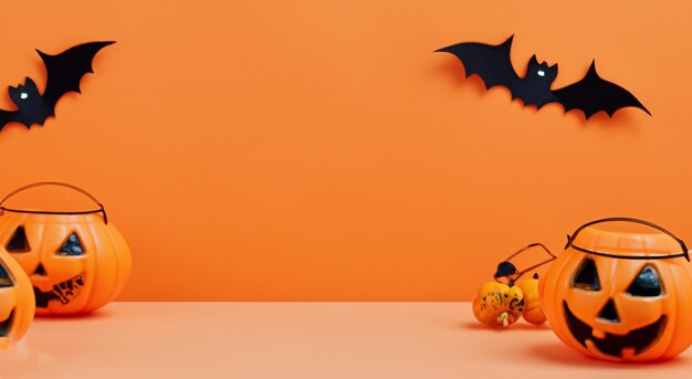 Scary halloween decoration in orange background with pumpkins with face in high resolution and sharpness october halloween concept