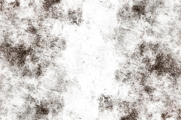 Разбросанная темная гранжевая текстура на белой бетонной стене