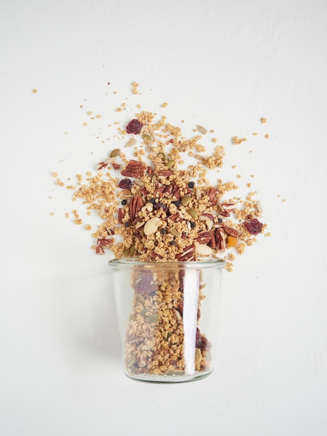 Scattered granola on white table