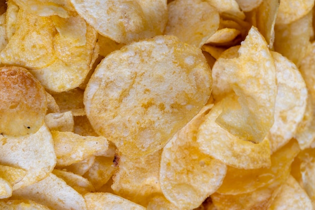 Scattered potato chips with natural spices