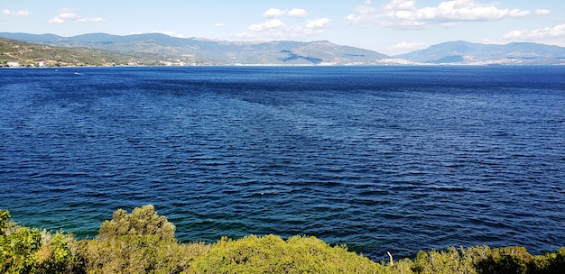 A scene of blue sky and seascape