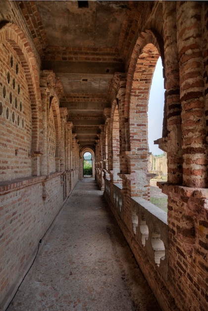 scene of the deserted and dilapidated colonial building