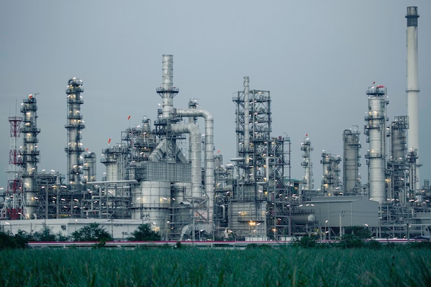 Scene evening of tank oil refinery plant tower and column tank oil