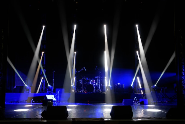 Scene, stage light with colored spotlights and smoke