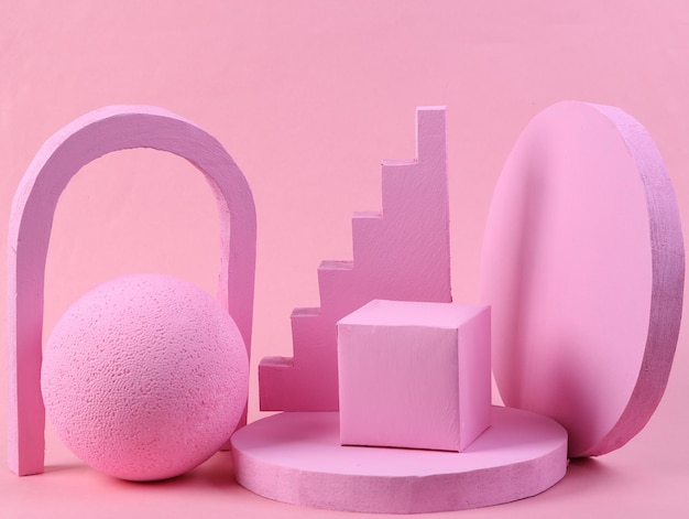 Scene with geometric shapes Pink background Pastel color trend Minimalism Creative composition still life