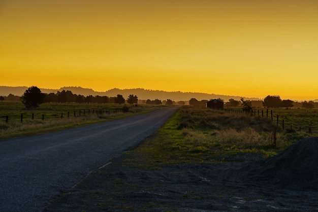 Scenery of countryside in twilight at sunset in Fox Glacier village , South Island of New Zealand