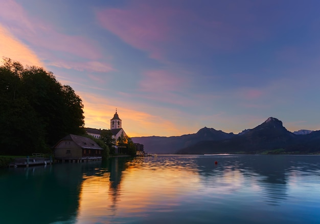 Scenery of Pilgrimage Church of St Wolfgang on the northern shore of Lake Wolfgang  Austria