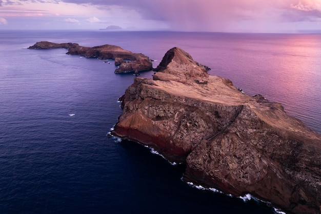 Scenery of rocks in sea in evening