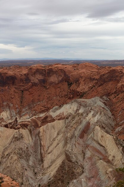 Scenic american landscape and red rock mountains in desert canyon