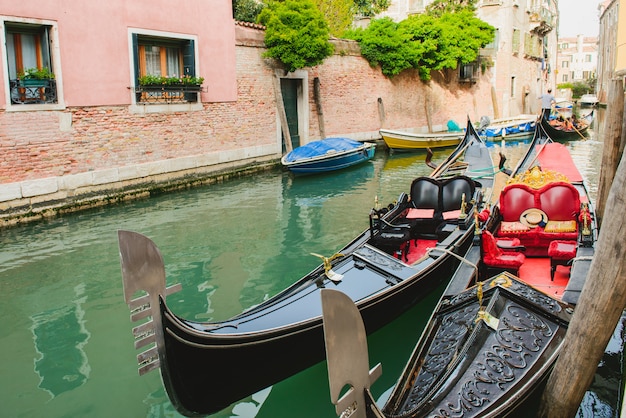 Scenic canal with gondola, Venice, Italy.