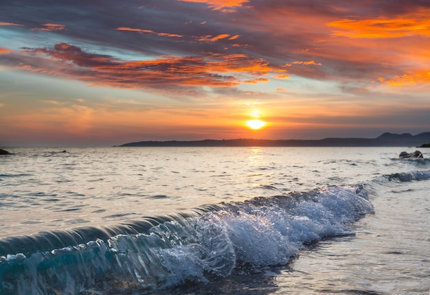 Scenic colorful sunset at the sea coast. Beautiful nature landscapes