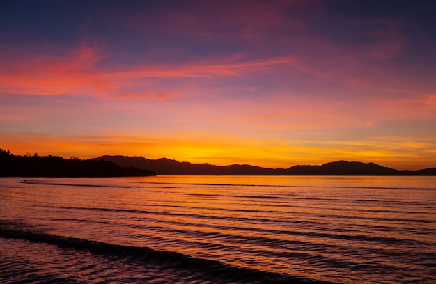 Scenic colorful sunset at the sea coast. Good for wallpaper or background image.