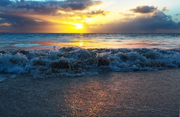 Scenic colorful sunset at the sea coast. Good for wallpaper or background image.