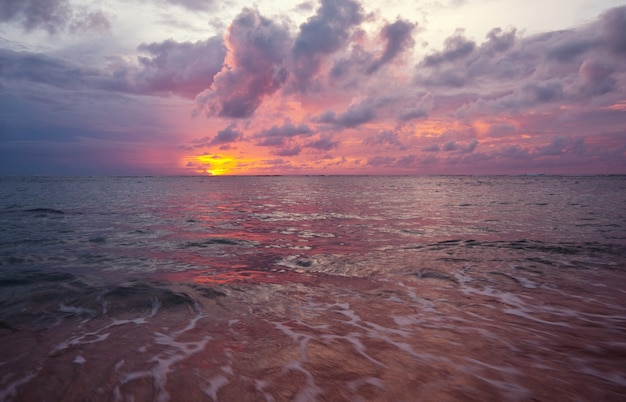 Scenic colorful sunset at the sea coast.