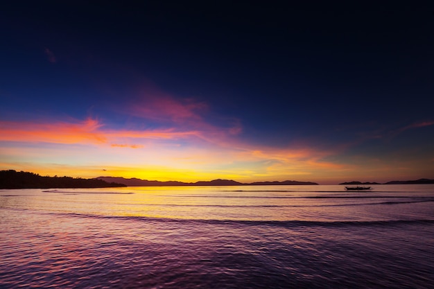 Scenic colorful sunset at the sea coast.