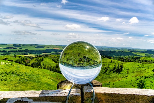 Scenic farmland countryside captured in a crystal ball