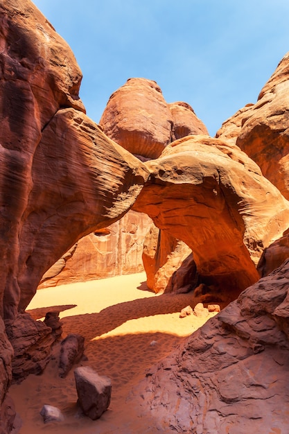 Scenic Landscape Arch between red rocky mountains in Arches National Park, Utah USA