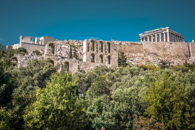 Scenic panorama of Acropolis hill with ancient Greek ruins in Athens