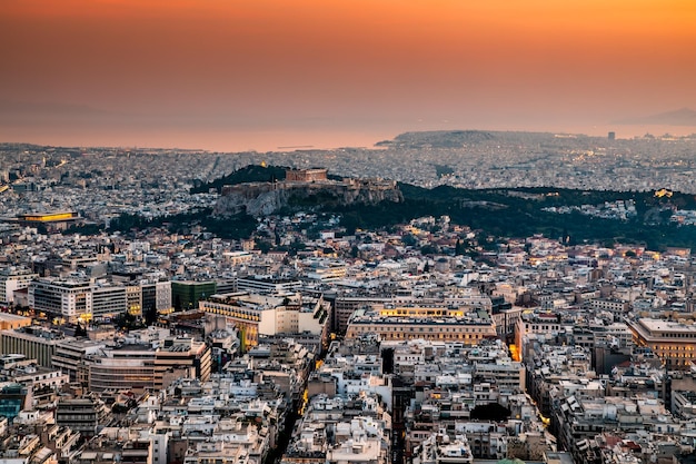 Scenic panoramic view on Acropolis in Athens Greece at sunrise Colourful travel background with dramatic sky