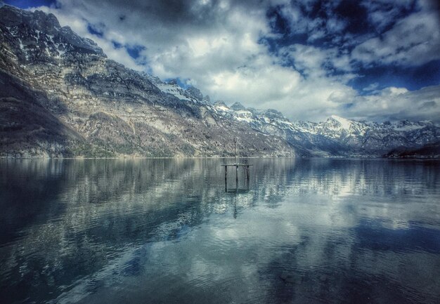 Scenic reflection of clouds in calm lake