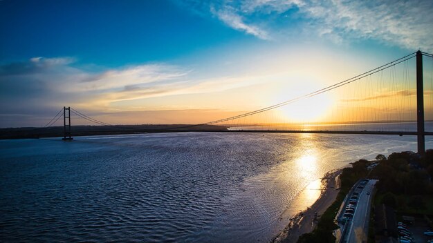 Scenic sunset behind the bridge in uk