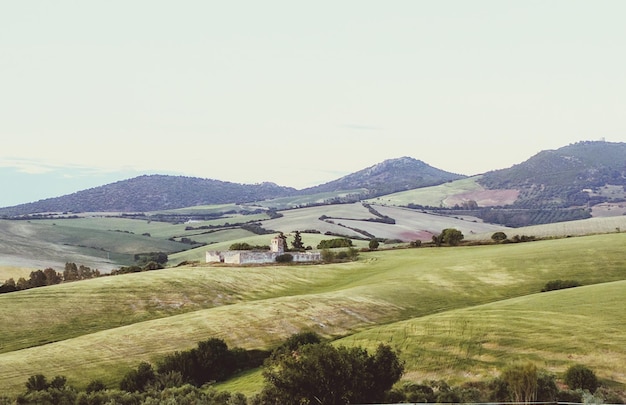 Photo scenic view of agricultural field against sky