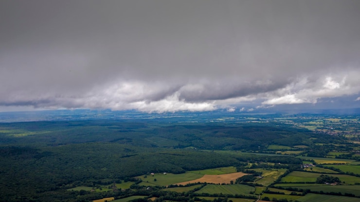 Photo scenic view of agricultural field against sky