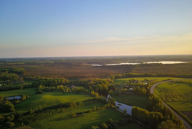 Photo scenic view of agricultural field against sky