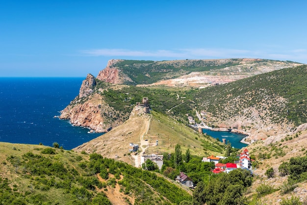 Scenic view of balaclava bay with yachts and ruines of genoese fortress chembalo balaklava