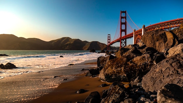 Photo scenic view of bay against clear sky