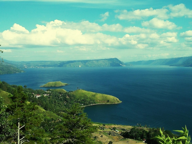 Scenic view of bay against sky