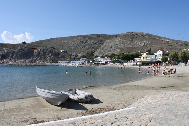 Scenic view of beach against blue sky