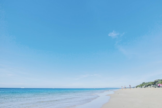 Photo scenic view of beach against clear blue sky