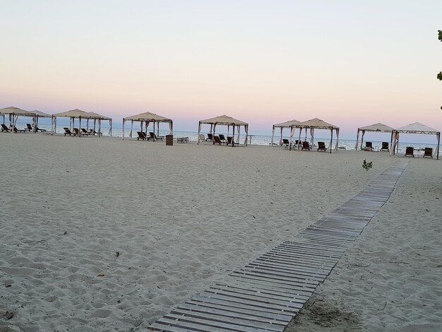 Scenic view of beach against clear sky