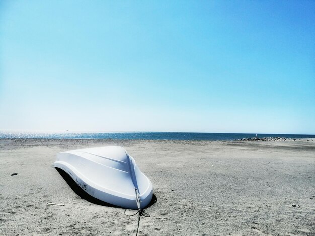 Scenic view of beach against clear sky