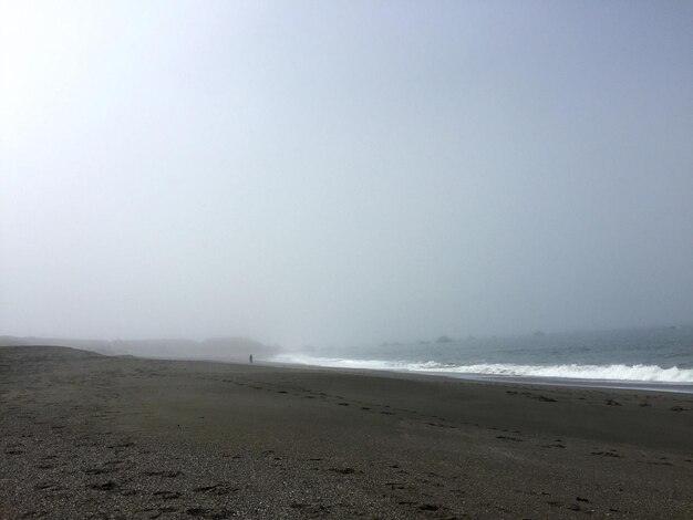 Photo scenic view of beach against clear sky