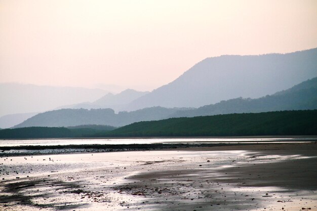 Scenic view of beach against clear sky