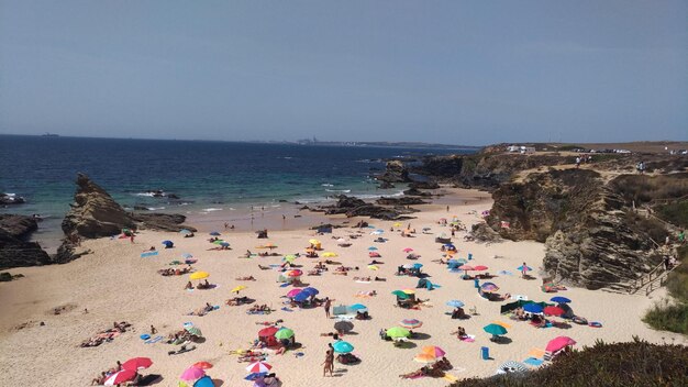 Scenic view of beach against clear sky