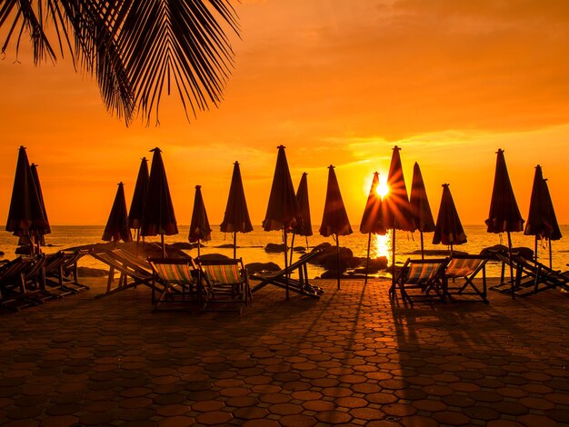 Scenic view of beach against sky during sunset