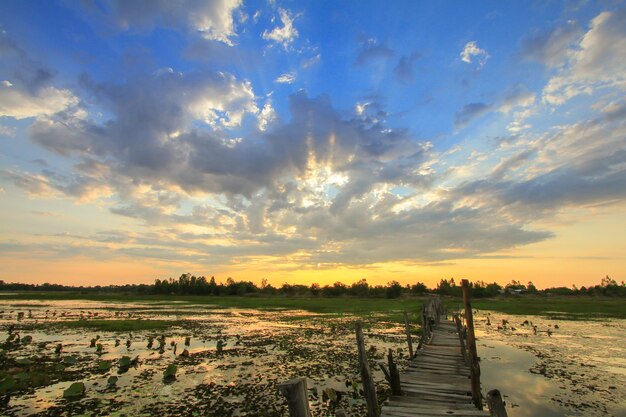 Scenic view of beach against sky during sunset