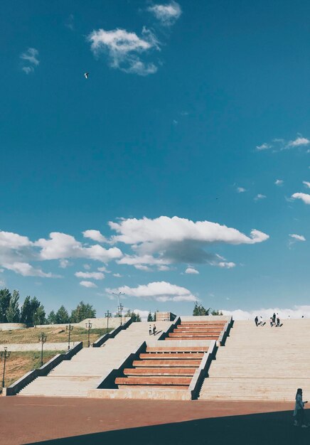 Scenic view of beach against sky on sunny day