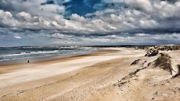 Photo scenic view of beach against sky