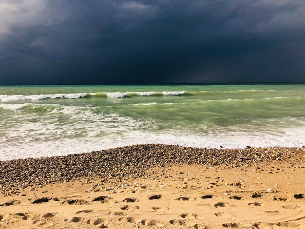 Scenic view of beach against sky