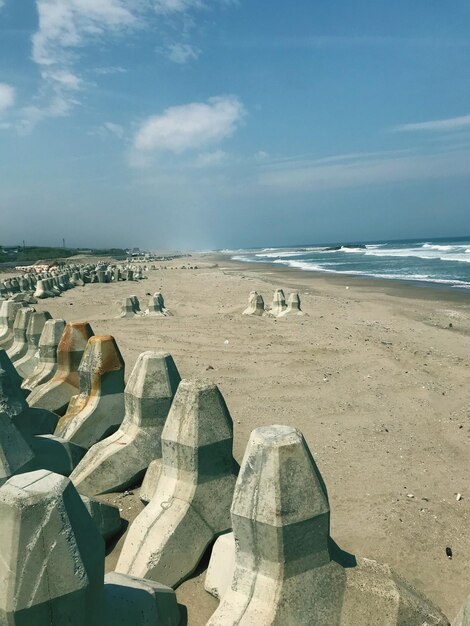 Scenic view of beach against sky