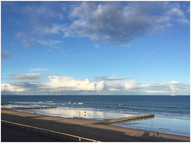 Scenic view of beach against sky